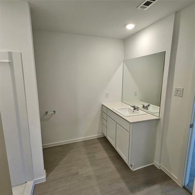 Bathroom, Dual Sink Vanities, Interior, Recessed Lighting, Wood Texture Flooring