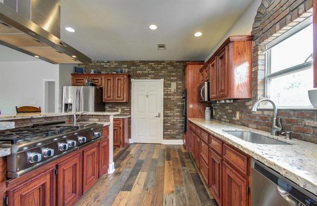 Interior, Kitchen, Recessed Lighting, Stainless Steel Appliances, Stone Walls, Wood Texture Flooring