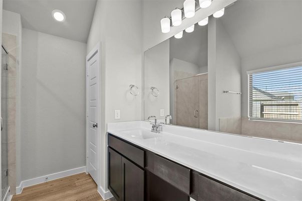 Bathroom, Dual Sink Vanities, Interior, Recessed Lighting, Wood Texture Flooring
