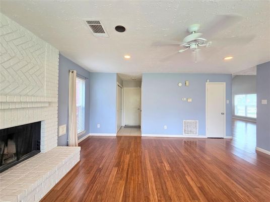Empty room, Fireplace, Interior, Recessed Lighting, Wood Texture Flooring