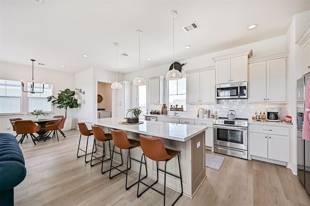Dining room, Interior, Kitchen, Pendant Lights, Recessed Lighting, Stainless Steel Appliances, Wood Texture Flooring