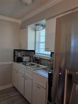 Interior, Kitchen, Tile Countertops, Wood Texture Flooring