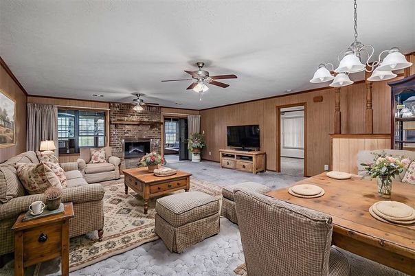 Chandelier, Dining room, Fireplace, Interior, Living room, Stone Walls