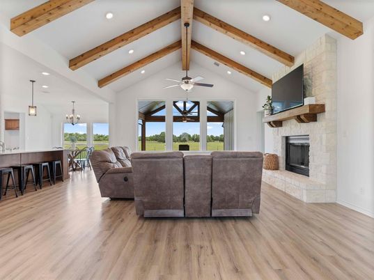 Dining room, Fireplace, Interior, Living room, Pendant Lights, Recessed Lighting, Wooden Beams, Wood Texture Flooring
