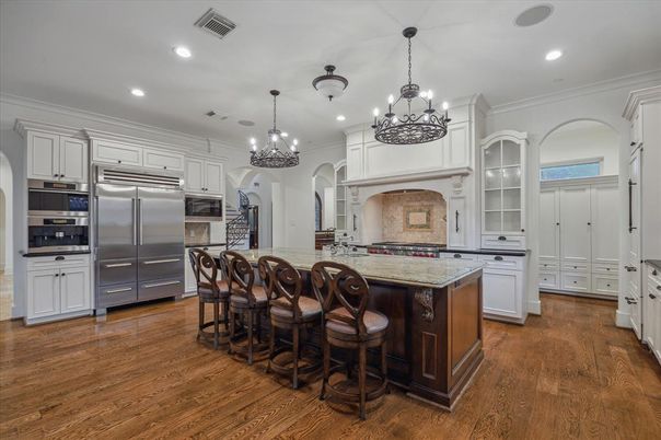 Chandelier, Interior, Kitchen, Pendant Lights, Recessed Lighting, Stainless Steel Appliances, Wood Texture Flooring