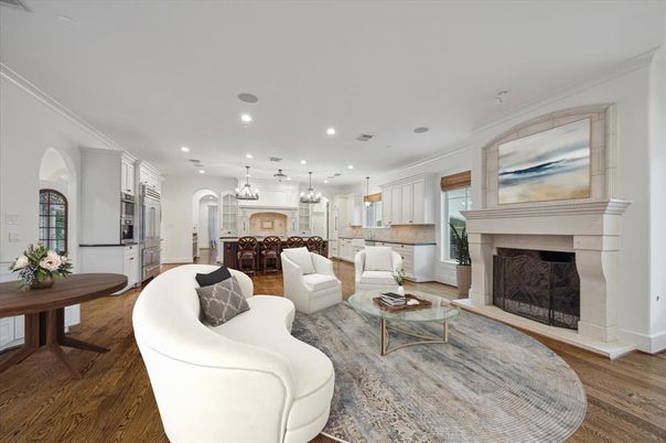 Dining room, Fireplace, Interior, Kitchen, Living room, Pendant Lights, Recessed Lighting, Stainless Steel Appliances, Wood Texture Flooring