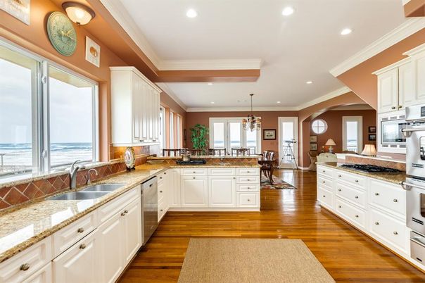 Chandelier, Dining room, Interior, Kitchen, Recessed Lighting, Stainless Steel Appliances, Wood Texture Flooring