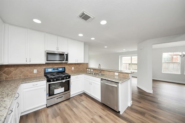 Interior, Kitchen, Recessed Lighting, Stainless Steel Appliances, Wood Texture Flooring