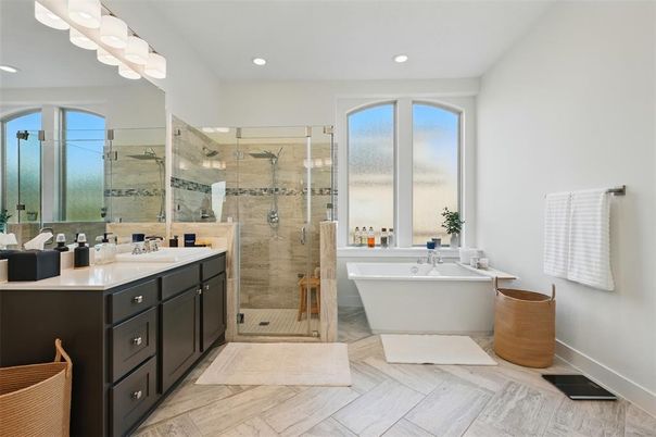 Bathroom, Dual Sink Vanities, Free Standing Baths, Glass Shower, Interior, Recessed Lighting, Wood Texture Flooring