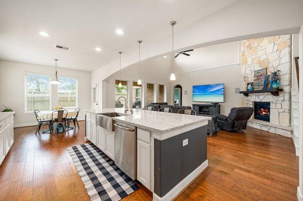 Dining room, Fireplace, Interior, Kitchen, Living room, Pendant Lights, Recessed Lighting, Wood Texture Flooring