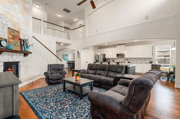 Fireplace, Interior, Kitchen, Living room, Recessed Lighting, Stone Walls, Wood Texture Flooring