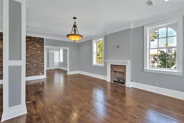 Empty room, Fireplace, Interior, Pendant Lights, Stone Walls, Wood Texture Flooring