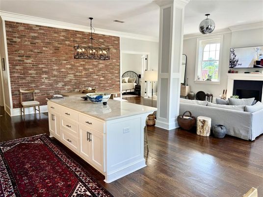 Chandelier, Fireplace, Interior, Kitchen, Living room, Pendant Lights, Stone Walls, Wood Texture Flooring