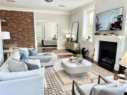 Fireplace, Interior, Living room, Recessed Lighting, Stone Walls, Wood Texture Flooring