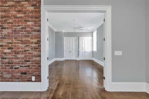 Empty room, Interior, Recessed Lighting, Stone Walls, Wood Texture Flooring