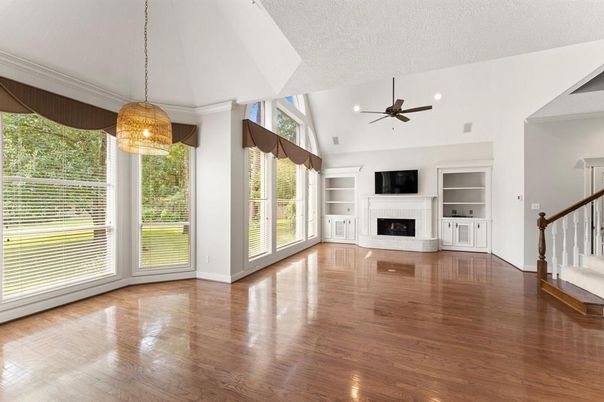 Empty room, Fireplace, Interior, Pendant Lights, Recessed Lighting, Wood Texture Flooring