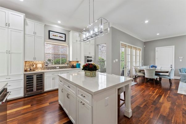 Dining room, Interior, Kitchen, Pendant Lights, Recessed Lighting, Stainless Steel Appliances, Wood Texture Flooring