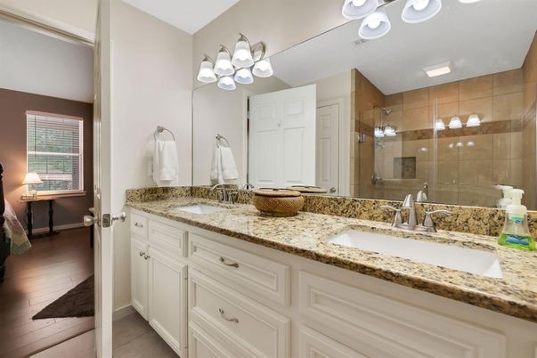Bathroom, Dual Sink Vanities, Glass Shower, Interior, Wood Texture Flooring