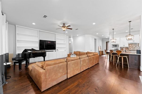Dining room, Interior, Kitchen, Living room, Pendant Lights, Piano, Recessed Lighting, Wood Texture Flooring