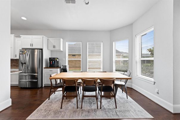 Dining room, Interior, Kitchen, Recessed Lighting, Stainless Steel Appliances, Wood Texture Flooring