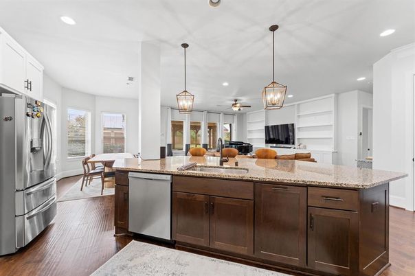 Dining room, Interior, Kitchen, Pendant Lights, Recessed Lighting, Stainless Steel Appliances, Wood Texture Flooring