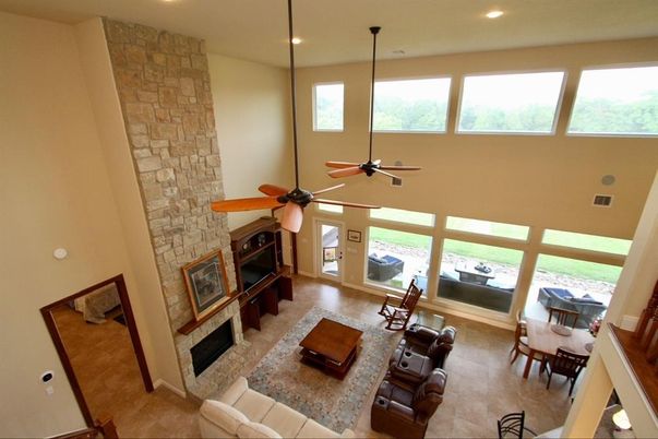 Dining room, Fireplace, Interior, Living room, Recessed Lighting, Stone Walls