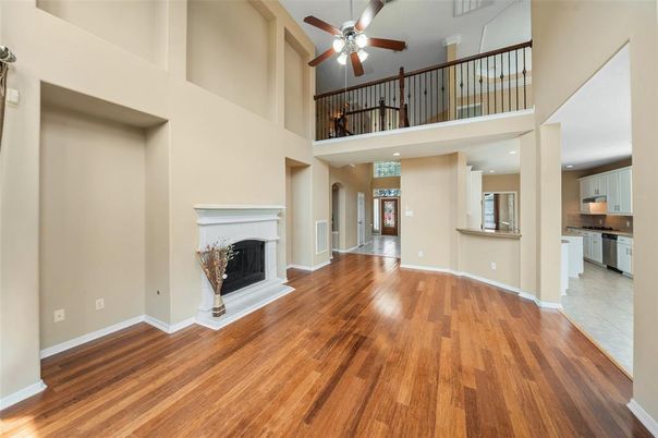 Fireplace, Interior, Kitchen, Recessed Lighting, Wood Texture Flooring