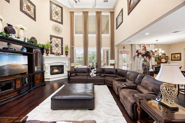 Chandelier, Fireplace, Interior, Living room, Recessed Lighting, Wood Texture Flooring