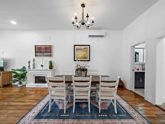 Chandelier, Dining room, Fireplace, Interior, Recessed Lighting, Wood Texture Flooring