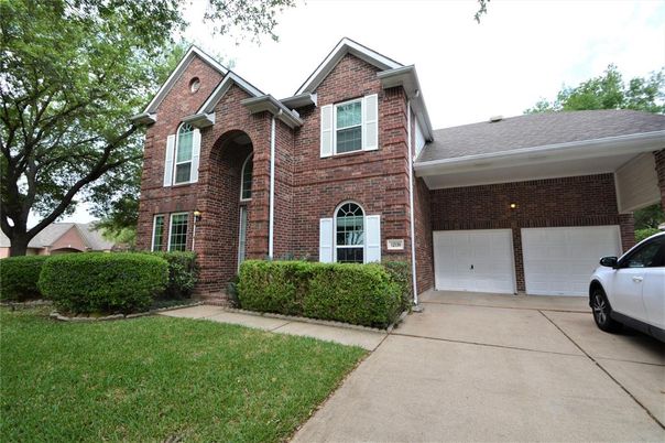 Attached, Exterior, Facade, Brick Facade, Brick Traditional
