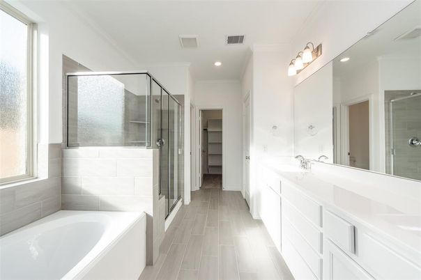 Bathroom, Dual Sink Vanities, Glass Shower, Interior, Recessed Lighting, Walk-in Closets, Wood Texture Flooring