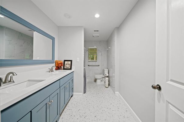 Bathroom, Dual Sink Vanities, Interior, Marble Walls, Recessed Lighting