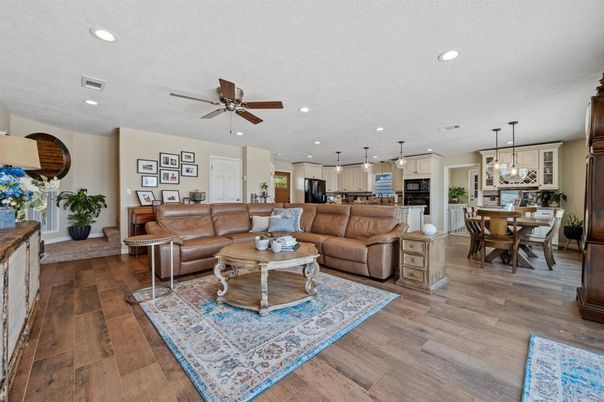 Dining room, Interior, Kitchen, Living room, Pendant Lights, Recessed Lighting, Stainless Steel Appliances, Wood Texture Flooring