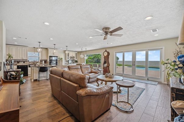 Dining room, Interior, Kitchen, Living room, Pendant Lights, Recessed Lighting, Water, Wood Texture Flooring