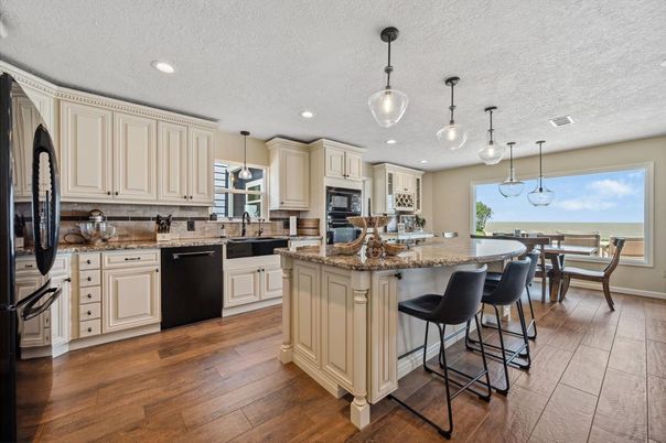 Dining room, Interior, Kitchen, Pendant Lights, Recessed Lighting, Water, Wood Texture Flooring