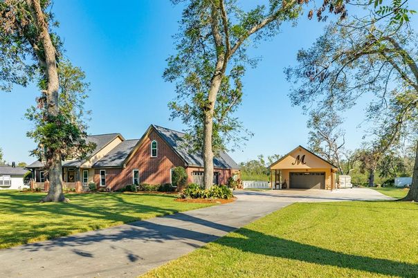 Attached, Backyard, Detached Garage, Exterior, Facade, Brick Facade, Tudor Revival