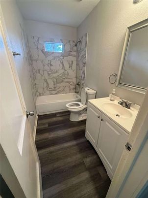 Bathroom, Dual Sink Vanities, Interior, Marble Walls, Wood Texture Flooring