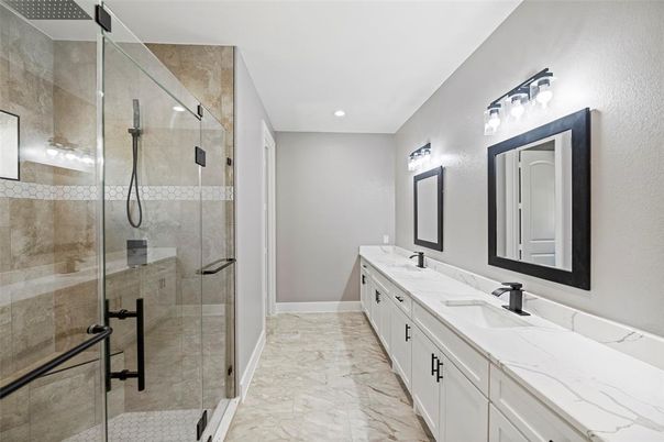 Bathroom, Dual Sink Vanities, Glass Shower, Interior, Marble, Recessed Lighting