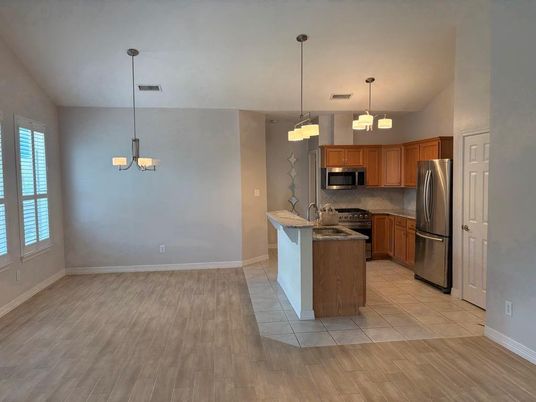 Chandelier, Interior, Kitchen, Pendant Lights, Stainless Steel Appliances, Wood Texture Flooring