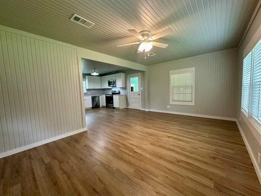 Empty room, Interior, Kitchen, Stainless Steel Appliances, Wood Texture Flooring