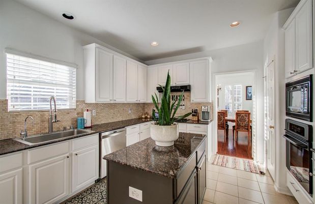 Dining room, Interior, Kitchen, Recessed Lighting, Stainless Steel Appliances, Wood Texture Flooring