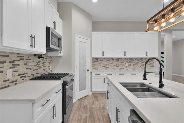 Interior, Kitchen, Recessed Lighting, Stainless Steel Appliances, Wood Texture Flooring
