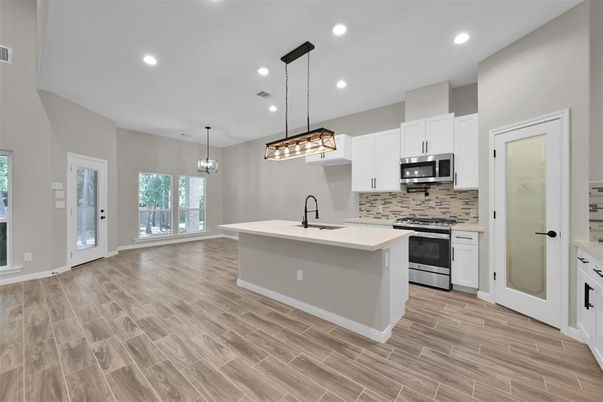 Interior, Kitchen, Pendant Lights, Recessed Lighting, Stainless Steel Appliances, Wood Texture Flooring