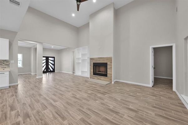 Empty room, Fireplace, Interior, Recessed Lighting, Wood Texture Flooring