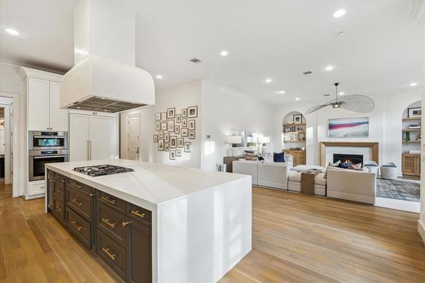 Fireplace, Interior, Kitchen, Living room, Pendant Lights, Recessed Lighting, Stainless Steel Appliances, Wood Texture Flooring
