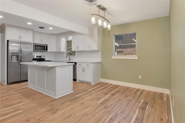 Interior, Kitchen, Pendant Lights, Recessed Lighting, Stainless Steel Appliances, Wood Texture Flooring