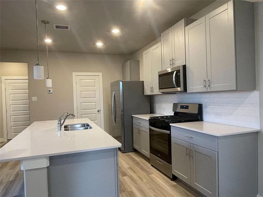 Interior, Kitchen, Pendant Lights, Recessed Lighting, Stainless Steel Appliances, Wood Texture Flooring
