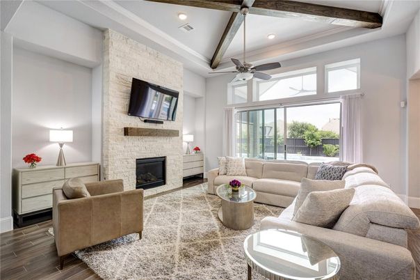 Fireplace, Interior, Living room, Recessed Lighting, Stone Walls, Wood Texture Flooring