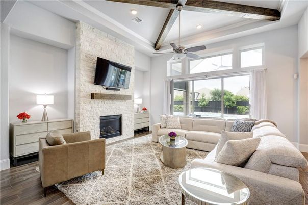 Fireplace, Interior, Living room, Recessed Lighting, Stone Walls, Wood Texture Flooring