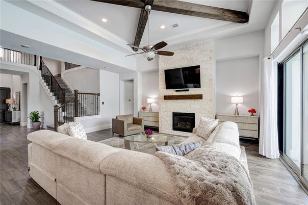 Fireplace, Interior, Living room, Recessed Lighting, Stone Walls, Wooden Beams, Wood Texture Flooring